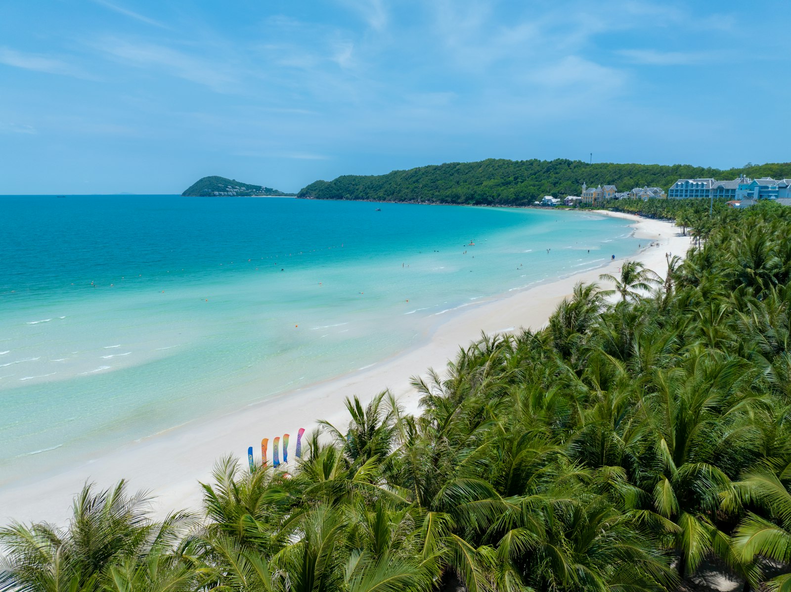 Aerial view of Kem Beach in Phu Quoc with turquoise sea, white sand and a palm-fringed resort coastline